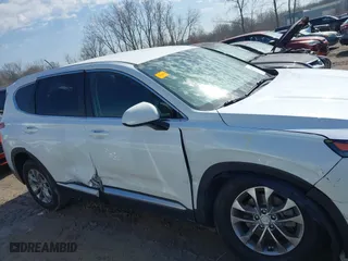 2019 Hyundai Santa Fe SE with VIN 5NMS23AD3KH070603, listed as a IAAI auction lot 41760416 with 62,676 mi miles. Bid and sale history available at carsss.com. Image 13.