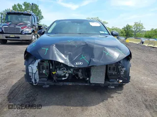 2021 Kia K5 LXS z VIN 5XXG14J25MG052084, wystawiony jako IAAI lot #42237008 z przebiegiem 31 278 mil mil oraz . Historia ofert i sprzedaży dostępna na DreamBid. Obrazek 12.