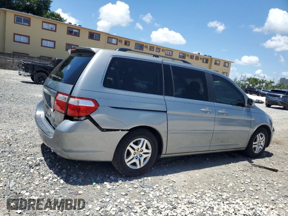 2007 Honda Odyssey EX z VIN 5FNRL38467B027951, wystawiony jako Copart lot #60109725 z przebiegiem 137 718 mil mil oraz Szkoda całkowita • Salvage title. Historia ofert i sprzedaży dostępna na DreamBid. Obrazek 3.