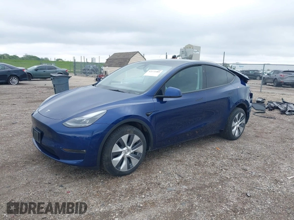 2023 Tesla Model Y Long Range z VIN 7SAYGDEE0PF840787, wystawiony jako IAAI lot #42172489 z przebiegiem 16 314 mil mil oraz . Historia ofert i sprzedaży dostępna na DreamBid. Obrazek 2.