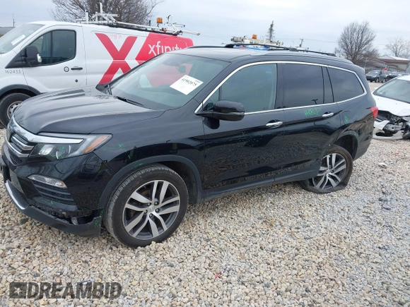 2017 Honda Pilot Touring with VIN 5FNYF6H90HB051700, listed as a IAAI auction lot 41902075 with 69,712 mi miles. Bid and sale history available at carsss.com. Image 2.