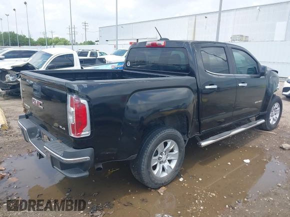 2015 GMC Canyon 2WD SLE with VIN 1GTG5BE3XF1226497, listed as a IAAI auction lot 42106960 with 97,360 mi miles and . Bid and sale history available at DreamBid. Image 4.