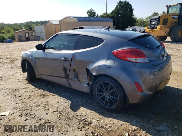 2016 Hyundai Veloster with VIN KMHTC6AD7GU248608, listed as a Copart auction lot 65809693 with 104,784 mi miles. Bid and sale history available at carsss.com. Image 2.