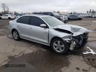 2012 Volkswagen Jetta Sedan TDI with VIN 3VW3L7AJ0CM089765, listed as a Copart auction lot 82358034 with 144,648 mi miles and Salvage Title. Bid and sale history available at carsss.com. Image 4.