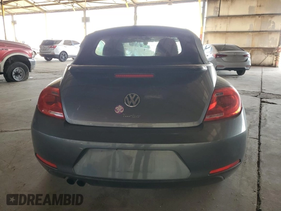 2016 Volkswagen Beetle Denim с VIN 3VW507AT8GM802601, выставлен на аукционе Copart как лот 60335415 с пробегом 71 163 миль миль и Списание • Salvage title. История ставок и продаж доступна на DreamBid. Изображение 6.