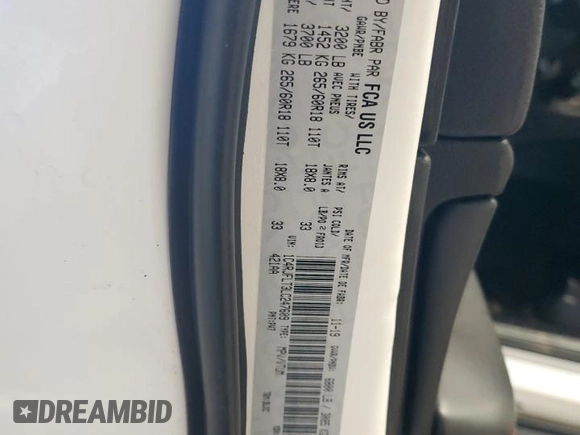2020 Jeep Grand Cherokee Trailhawk with VIN 1C4RJFLT3LC247609, listed as a Copart auction lot 84491864 with 68,957 mi miles and Salvage title. Bid and sale history available at DreamBid. Image 14.