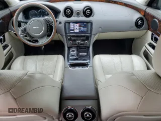 2014 Jaguar XJ z VIN SAJWJ1CD9E8V62338, wystawiony jako Copart lot #58924065 z przebiegiem 60 909 mil mil oraz Czysty tytuł • Clean title. Historia ofert i sprzedaży dostępna na DreamBid. Obrazek 8.