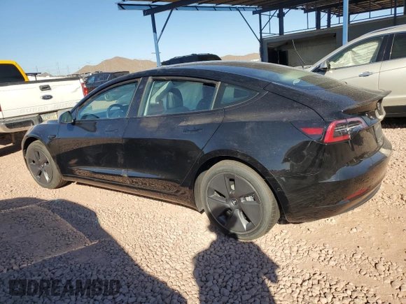2021 Tesla Model 3 Standard Range Plus with VIN 5YJ3E1EA3MF996701, listed as a Copart auction lot 47013195 with 34,177 mi miles and Salvage Title. Bid and sale history available at carsss.com. Image 2.