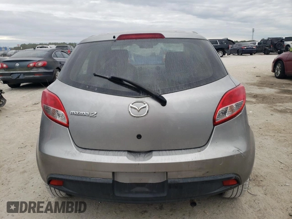 2012 Mazda 2 Sport with VIN JM1DE1KY1C0140803, listed as a Copart auction lot 83420714 with 153,730 mi miles and Salvage Title. Bid and sale history available at DreamBid. Image 6.