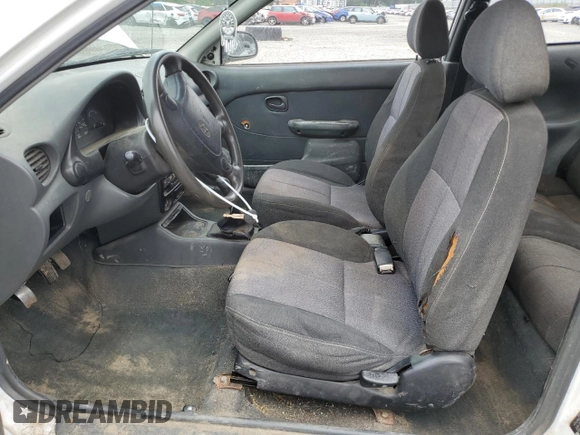 1999 Hyundai Accent with VIN KMHVD14N9XU503210, listed as a Copart auction lot 56486325 with 195,501 mi miles and Salvage title. Bid and sale history available at DreamBid. Image 7.