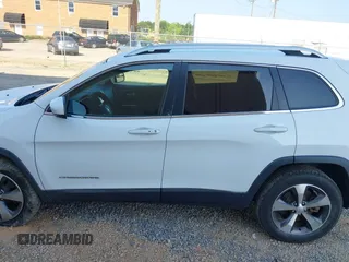 2020 Jeep Cherokee Limited with VIN 1C4PJMDXXLD612052, listed as a IAAI auction lot 42582343 with 96,072 mi miles and . Bid and sale history available at DreamBid. Image 14.