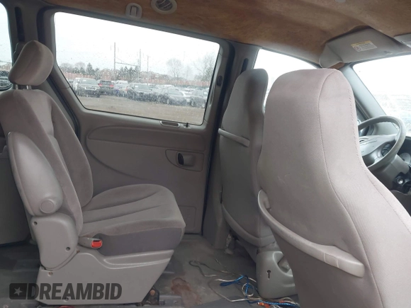 2003 Chrysler Town & Country with VIN 2C4GP24R43R255341, listed as a IAAI auction lot 41687331 with 129,592 mi miles. Bid and sale history available at carsss.com. Image 8.
