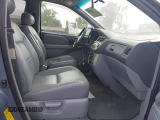2001 Toyota Sienna LE z VIN 4T3ZF13C41U373962, wystawiony jako IAAI lot #42489583 z przebiegiem 142 135 mil mil oraz . Historia ofert i sprzedaży dostępna na DreamBid. Obrazek 5.
