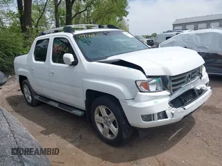 2012 Honda Ridgeline RTL z VIN 5FPYK1F57CB453096, wystawiony jako IAAI lot #42206169 z przebiegiem 82 846 mil mil oraz . Historia ofert i sprzedaży dostępna na DreamBid. Obrazek 1.