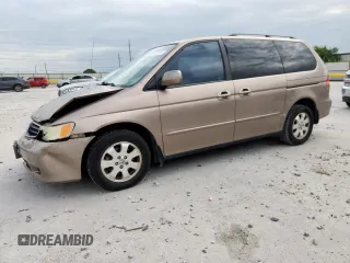 2003 Honda Odyssey EX-L with VIN 5FNRL18953B117585, listed as a Copart auction lot 62961945 with 133,142 mi miles and Salvage title. Bid and sale history available at DreamBid. Image 1.