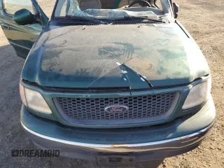 2000 Ford F-150 XL with VIN 1FTRX17W4YNB17453, listed as a Copart auction lot 52051215 with Not provided miles and Salvage title. Bid and sale history available at DreamBid. Image 12.