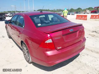 2011 Ford Fusion SE with VIN 3FAHP0HA0BR345629, listed as a IAAI auction lot 42029047 with 145,505 mi miles. Bid and sale history available at carsss.com. Image 3.