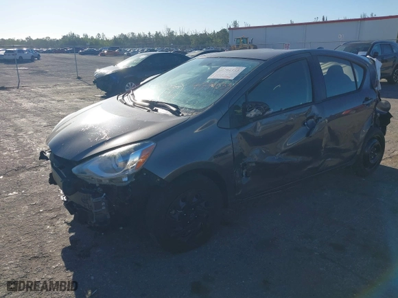 2015 Toyota Prius c One with VIN JTDKDTB3XF1102205, listed as a IAAI auction lot 41794533 with 144,788 mi miles. Bid and sale history available at carsss.com. Image 20.