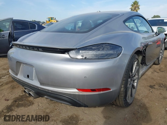 2021 Porsche Cayman with VIN WP0AA2A82MS260377, listed as a IAAI auction lot 40970360 with 23,785 mi miles and . Bid and sale history available at DreamBid. Image 4.