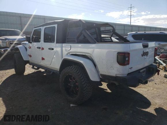 2020 Jeep Gladiator Rubicon with VIN 1C6JJTBG7LL152204, listed as a Copart auction lot 83525554 with 7,030 mi miles and Salvage title. Bid and sale history available at DreamBid. Image 2.