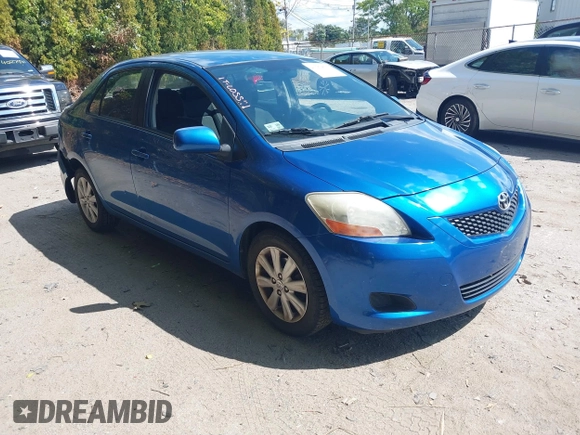 2009 Toyota Yaris with VIN JTDBT903091345311, listed as a IAAI auction lot 40269675 with 156,874 mi miles. Bid and sale history available at carsss.com. Image 1.