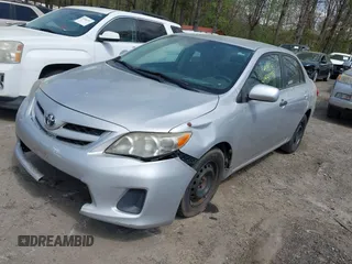 2011 Toyota Corolla L with VIN 2T1BU4EE8BC687021, listed as a IAAI auction lot 41934778 with 176,587 mi miles. Bid and sale history available at carsss.com. Image 2.