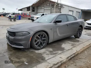 2020 Dodge Charger SXT with VIN 2C3CDXBG1LH114890, listed as a Copart auction lot 42984485 with 63,374 mi miles and Salvage Title. Bid and sale history available at carsss.com. Image 1.
