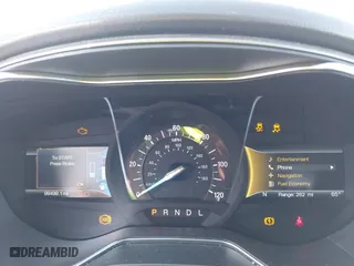 2017 Ford Fusion Energi SE with VIN 3FA6P0PU7HR373391, listed as a IAAI auction lot 41677525 with 99,499 mi miles. Bid and sale history available at carsss.com. Image 7.