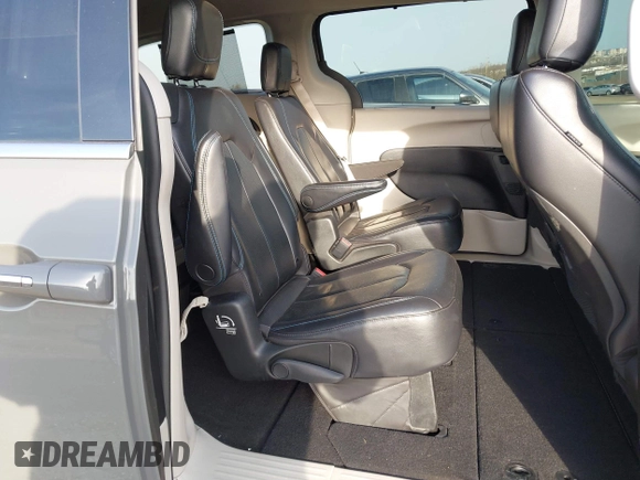 2021 Chrysler Pacifica Touring L with VIN 2C4RC1BG4MR598328, listed as a IAAI auction lot 41749306 with 78,035 mi miles and . Bid and sale history available at DreamBid. Image 8.