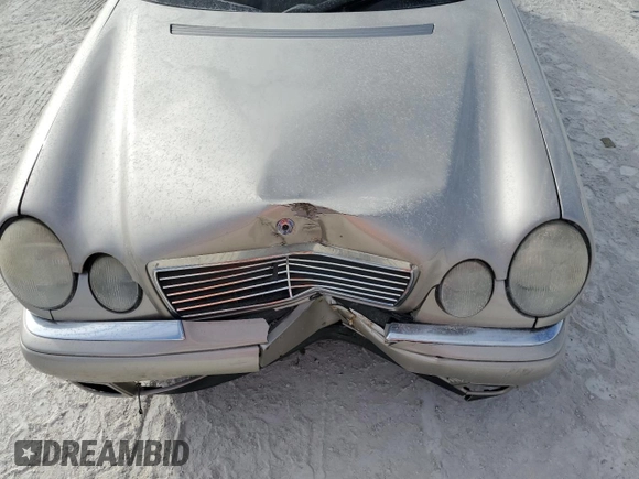 1999 Mercedes-Benz E-Class with VIN WDBJF82H9XX022535, listed as a Copart auction lot 86554534 with 140,904 mi miles and Salvage Title. Bid and sale history available at carsss.com. Image 12.