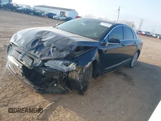 2017 Lincoln MKZ Hybrid Reserve z VIN 3LN6L5MU2HR634929, wystawiony jako IAAI lot #42065636 z przebiegiem 100 165 mil mil oraz . Historia ofert i sprzedaży dostępna na DreamBid. Obrazek 2.