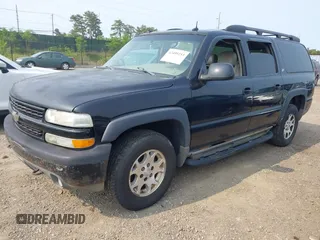 2003 Chevrolet Suburban Z71 with VIN 3GNFK16T23G325753, listed as a IAAI auction lot 42409253 with 247,494 mi miles and . Bid and sale history available at DreamBid. Image 2.