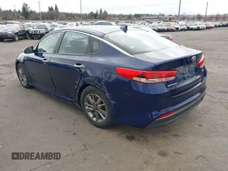 2016 Kia Optima LX Turbo with VIN 5XXGT4L11GG006576, listed as a IAAI auction lot 41666504 with 87,257 mi miles. Bid and sale history available at carsss.com. Image 3.