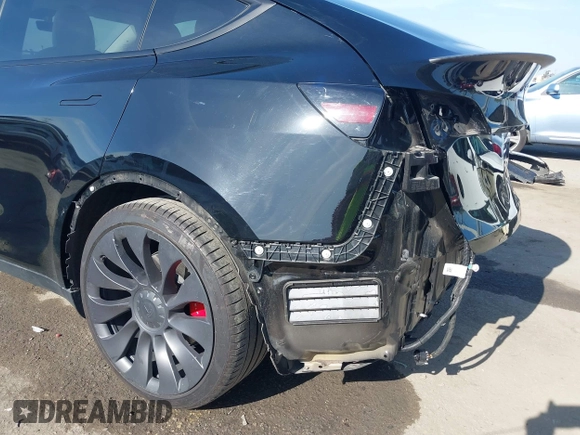 2021 Tesla Model Y Performance with VIN 5YJYGDEF1MF092889, listed as a IAAI auction lot 42076715 with 48,373 mi miles and . Bid and sale history available at DreamBid. Image 19.