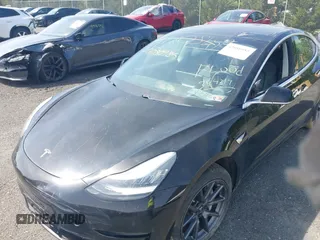 2019 Tesla Model 3 Mid Range with VIN 5YJ3E1EA0KF394514, listed as a IAAI auction lot 42080985 with Not Provided miles and . Bid and sale history available at DreamBid. Image 6.