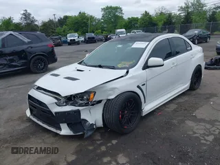 2013 Mitsubishi Lancer Evolution GSR z VIN JA32W8FV0DU023509, wystawiony jako IAAI lot #42222552 z przebiegiem 128 030 mil mil oraz . Historia ofert i sprzedaży dostępna na DreamBid. Obrazek 17.