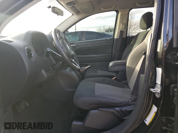 2011 Jeep Compass with VIN 1J4NT1FB1BD192241, listed as a Copart auction lot 48033115 with 60,123 mi miles and Salvage Title. Bid and sale history available at carsss.com. Image 7.