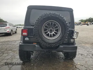 2023 Jeep Wrangler Sport with VIN 1C4HJXDN9PW638737, listed as a Copart auction lot 71367284 with 12,054 mi miles and Salvage Title. Bid and sale history available at DreamBid. Image 6.