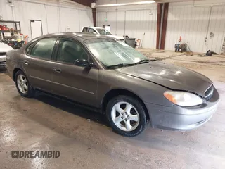 2003 Ford Taurus SE Standard z VIN 1FAFP53UX3G167579, wystawiony jako IAAI lot #42140606 z przebiegiem 178 147 mil mil oraz . Historia ofert i sprzedaży dostępna na DreamBid. Obrazek 1.