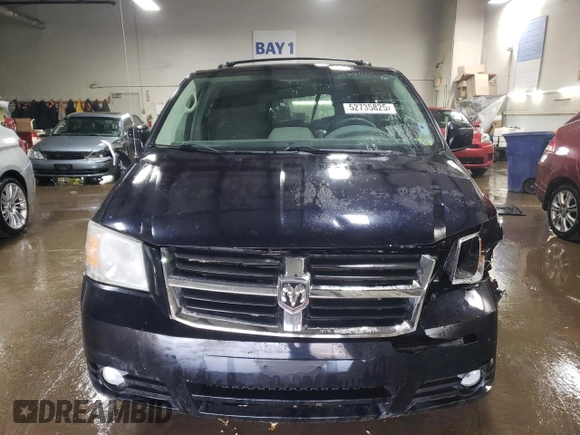 2010 Dodge Grand Caravan SXT with VIN 2D4RN5D15AR140564, listed as a Copart auction lot 52735825 with 187,744 mi miles and Salvage Title. Bid and sale history available at DreamBid. Image 5.