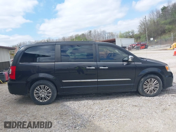 2015 Chrysler Town & Country Touring L with VIN 2C4RC1CG8FR522404, listed as a IAAI auction lot 41932426 with 165,092 mi miles and . Bid and sale history available at DreamBid. Image 13.