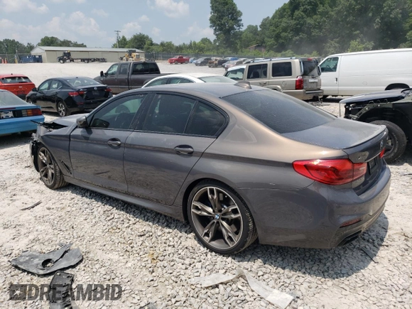 2020 BMW 5 Series M550i xDrive with VIN WBAJS7C08LCD82431, listed as a Copart auction lot 59518835 with 33,184 mi miles and Salvage title. Bid and sale history available at DreamBid. Image 2.