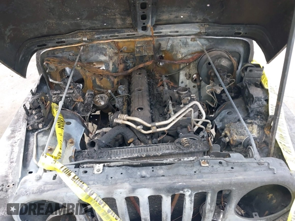 2000 Jeep Wrangler Sport with VIN 1J4FA49S5YP797345, listed as a IAAI auction lot 40322775 with Not Provided miles and . Bid and sale history available at DreamBid. Image 6.