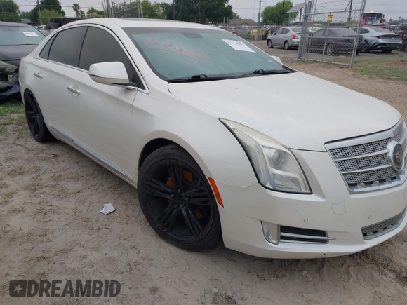 2013 Cadillac XTS Platinum z VIN 2G61U5S3XD9208737, wystawiony jako IAAI lot #41928451 z przebiegiem 167 984 mil mil oraz . Historia ofert i sprzedaży dostępna na DreamBid. Obrazek 1.