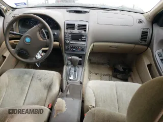 2001 Nissan Maxima SE z VIN JN1CA31D81T606081, wystawiony jako Copart lot #82989204 z przebiegiem 181 732 mil mil oraz Tytuł czysty. Historia ofert i sprzedaży dostępna na DreamBid. Obrazek 8.
