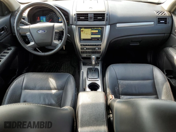 2010 Ford Fusion Hybrid с VIN 3FADP0L32AR310256, выставлен на аукционе Copart как лот 54310965 с пробегом 126 258 миль миль и Списание • Salvage title. История ставок и продаж доступна на DreamBid. Изображение 8.
