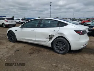 2023 Tesla Model 3 with VIN 5YJ3E1EA0PF575488, listed as a Copart auction lot 56889115 with 18,677 mi miles and Clean title. Bid and sale history available at DreamBid. Image 2.