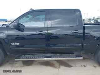 2018 Chevrolet Silverado 1500 LT with VIN 3GCPCREC5JG557884, listed as a IAAI auction lot 41889798 with 112,668 mi miles. Bid and sale history available at carsss.com. Image 14.