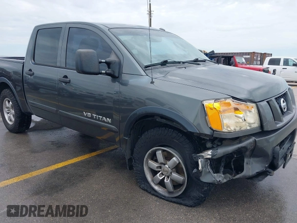 2010 Nissan Titan Pro-4X with VIN 1N6BA0EC9AN323943, listed as a IAAI auction lot 42795482 with 200,453 mi miles and . Bid and sale history available at DreamBid. Image 17.