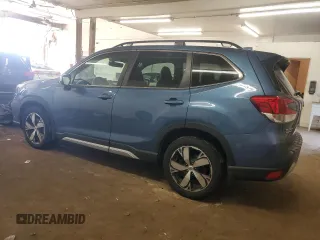 2021 Subaru Forester Touring z VIN JF2SKAXC9MH517699, wystawiony jako Copart lot #58962835 z przebiegiem 60 984 mil mil oraz Szkoda całkowita • Salvage title. Historia ofert i sprzedaży dostępna na DreamBid. Obrazek 2.